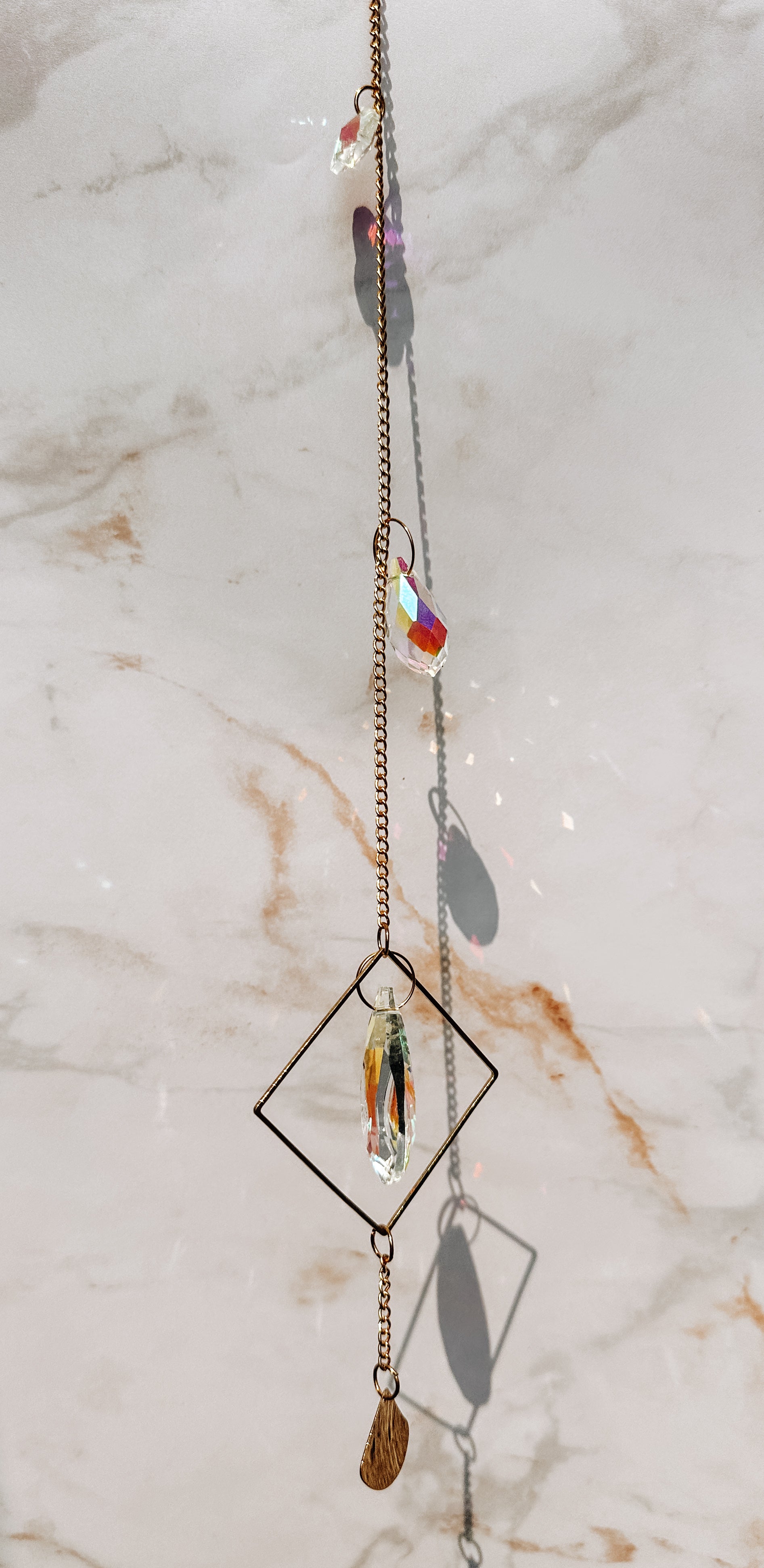 Attrape-soleil Losange doré 🔶